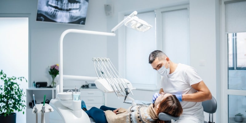 Patient in dental chair during appointment - Dental Supplies: Your Top 10 Questions Answered
